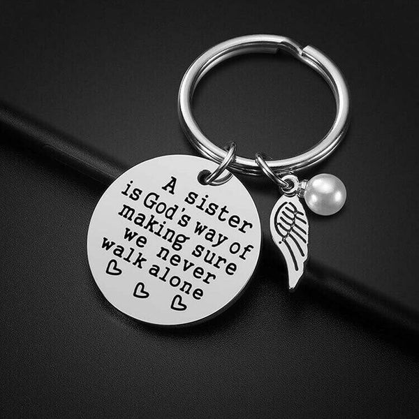 A Sister is God's Way of Making Sure We Never Walk Alone Keychain